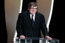 Na foto acima, o cineasta Michael Moore